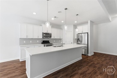 Turnkey. Lagoon Views. Gated Community Living. Enjoy easy on Savannah Quarters Country Club in Georgia - for sale on GolfHomes.com, golf home, golf lot