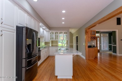 This gorgeous brick home in desirable Pinewild CC is situated on on Pinewild Country Club of Pinehurst in North Carolina - for sale on GolfHomes.com, golf home, golf lot