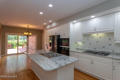 This gorgeous brick home in desirable Pinewild CC is situated on on Pinewild Country Club of Pinehurst in North Carolina - for sale on GolfHomes.com, golf home, golf lot