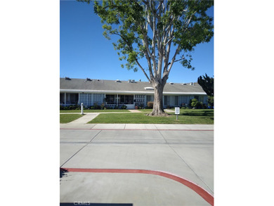 Look onto the relaxing view of the greenbelt in this northeast on Leisure World Seal Beach Golf Course in California - for sale on GolfHomes.com, golf home, golf lot
