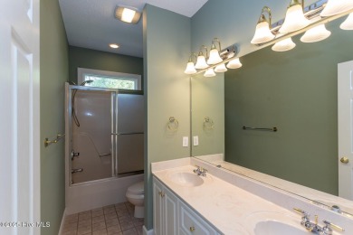 This gorgeous brick home in desirable Pinewild CC is situated on on Pinewild Country Club of Pinehurst in North Carolina - for sale on GolfHomes.com, golf home, golf lot