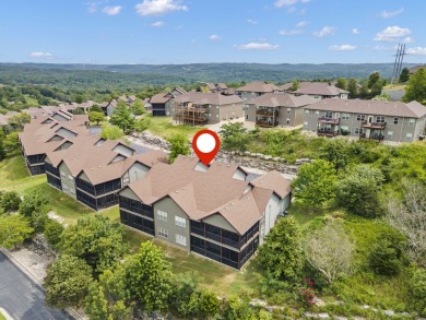 Welcome to your next scenic getaway! This charming two-bedroom on Ledgestone Country Club and Golf Course in Missouri - for sale on GolfHomes.com, golf home, golf lot