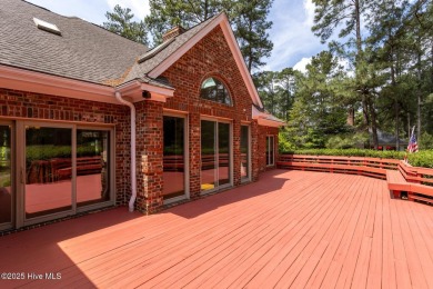 This gorgeous brick home in desirable Pinewild CC is situated on on Pinewild Country Club of Pinehurst in North Carolina - for sale on GolfHomes.com, golf home, golf lot