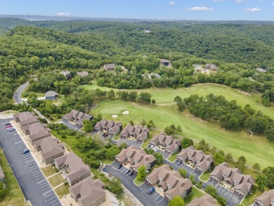 Welcome to your next scenic getaway! This charming two-bedroom on Ledgestone Country Club and Golf Course in Missouri - for sale on GolfHomes.com, golf home, golf lot