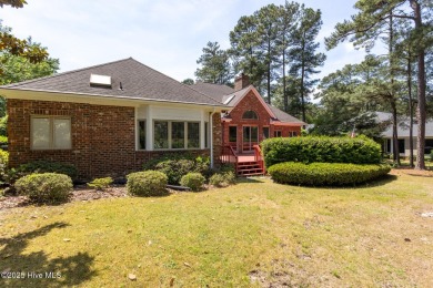 This gorgeous brick home in desirable Pinewild CC is situated on on Pinewild Country Club of Pinehurst in North Carolina - for sale on GolfHomes.com, golf home, golf lot