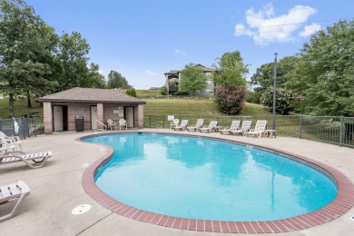 Welcome to your next scenic getaway! This charming two-bedroom on Ledgestone Country Club and Golf Course in Missouri - for sale on GolfHomes.com, golf home, golf lot