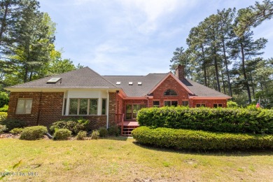 This gorgeous brick home in desirable Pinewild CC is situated on on Pinewild Country Club of Pinehurst in North Carolina - for sale on GolfHomes.com, golf home, golf lot