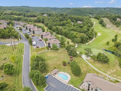 Welcome to your next scenic getaway! This charming two-bedroom on Ledgestone Country Club and Golf Course in Missouri - for sale on GolfHomes.com, golf home, golf lot