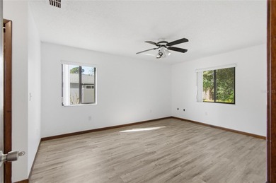 Welcome home to this beautifully updated 2-bedroom, 2-bath gem on The Grand Club - Pine Lakes Course in Florida - for sale on GolfHomes.com, golf home, golf lot