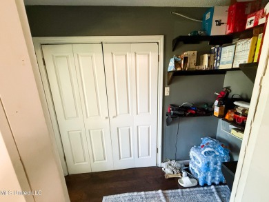 Take a look at this beautiful home located at the end of a on Diamondhead Country Club in Mississippi - for sale on GolfHomes.com, golf home, golf lot