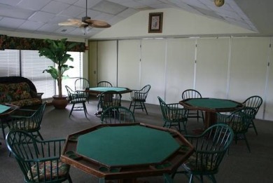 TIRED OF SNOW,ICE AND COLD, TRADE IT IN FOR SUN,WARM AND WHITE on Pine Lakes Country Club in Florida - for sale on GolfHomes.com, golf home, golf lot