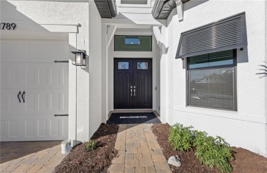 Move-in ready and located in the premier gated community of on Valencia Golf and Country Club in Florida - for sale on GolfHomes.com, golf home, golf lot