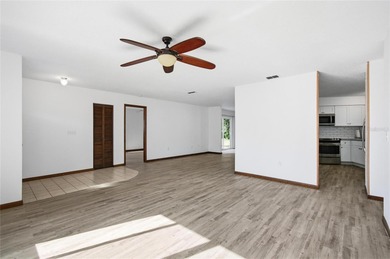 Welcome home to this beautifully updated 2-bedroom, 2-bath gem on The Grand Club - Pine Lakes Course in Florida - for sale on GolfHomes.com, golf home, golf lot