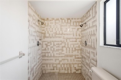 Welcome home to this beautifully updated 2-bedroom, 2-bath gem on The Grand Club - Pine Lakes Course in Florida - for sale on GolfHomes.com, golf home, golf lot