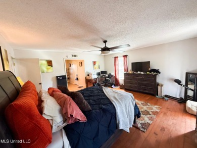 Take a look at this beautiful home located at the end of a on Diamondhead Country Club in Mississippi - for sale on GolfHomes.com, golf home, golf lot