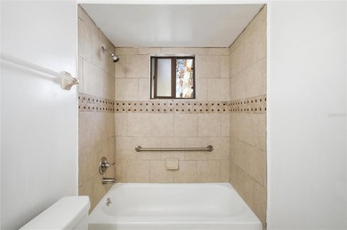 Welcome home to this beautifully updated 2-bedroom, 2-bath gem on The Grand Club - Pine Lakes Course in Florida - for sale on GolfHomes.com, golf home, golf lot