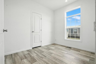 Come see this affordable and spacious 3-bed, 2-bath manufactured on Rapid City Elks Golf Course in South Dakota - for sale on GolfHomes.com, golf home, golf lot
