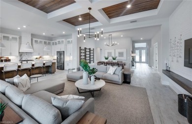 Move-in ready and located in the premier gated community of on Valencia Golf and Country Club in Florida - for sale on GolfHomes.com, golf home, golf lot