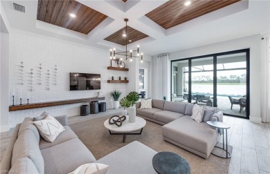 Move-in ready and located in the premier gated community of on Valencia Golf and Country Club in Florida - for sale on GolfHomes.com, golf home, golf lot