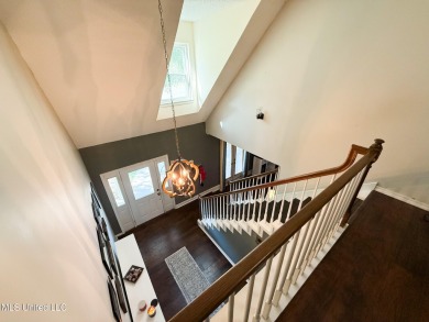 Take a look at this beautiful home located at the end of a on Diamondhead Country Club in Mississippi - for sale on GolfHomes.com, golf home, golf lot