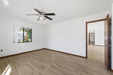 Welcome home to this beautifully updated 2-bedroom, 2-bath gem on The Grand Club - Pine Lakes Course in Florida - for sale on GolfHomes.com, golf home, golf lot