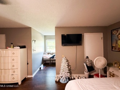 Take a look at this beautiful home located at the end of a on Diamondhead Country Club in Mississippi - for sale on GolfHomes.com, golf home, golf lot