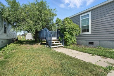 Come see this affordable and spacious 3-bed, 2-bath manufactured on Rapid City Elks Golf Course in South Dakota - for sale on GolfHomes.com, golf home, golf lot