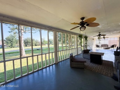 Take a look at this beautiful home located at the end of a on Diamondhead Country Club in Mississippi - for sale on GolfHomes.com, golf home, golf lot