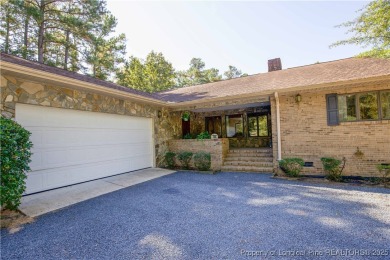 Welcome to this stunning 3-bedroom, 3-bath all-brick home on Woodlake Country Club in North Carolina - for sale on GolfHomes.com, golf home, golf lot