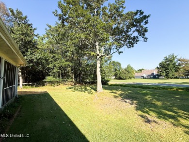 Take a look at this beautiful home located at the end of a on Diamondhead Country Club in Mississippi - for sale on GolfHomes.com, golf home, golf lot