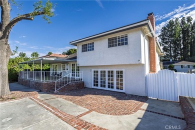 Looking for a remodeled 5-bedroom Porter Ranch home for sale on Porter Valley Country Club in California - for sale on GolfHomes.com, golf home, golf lot