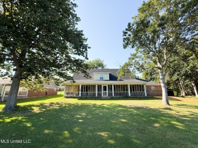 Take a look at this beautiful home located at the end of a on Diamondhead Country Club in Mississippi - for sale on GolfHomes.com, golf home, golf lot