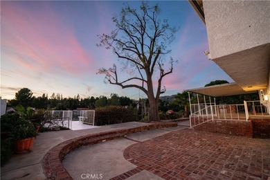 Looking for a remodeled 5-bedroom Porter Ranch home for sale on Porter Valley Country Club in California - for sale on GolfHomes.com, golf home, golf lot