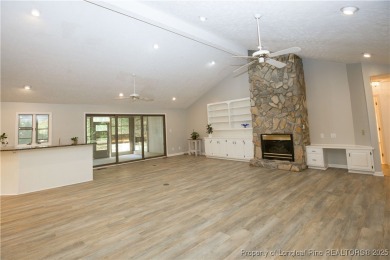 Welcome to this stunning 3-bedroom, 3-bath all-brick home on Woodlake Country Club in North Carolina - for sale on GolfHomes.com, golf home, golf lot