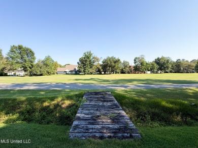 Take a look at this beautiful home located at the end of a on Diamondhead Country Club in Mississippi - for sale on GolfHomes.com, golf home, golf lot