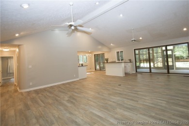 Welcome to this stunning 3-bedroom, 3-bath all-brick home on Woodlake Country Club in North Carolina - for sale on GolfHomes.com, golf home, golf lot