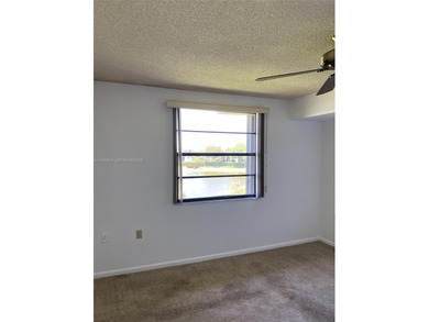 Large and bright condo. 2BR/2BA + extra large laundry room. All on Bear Lakes Country Club in Florida - for sale on GolfHomes.com, golf home, golf lot