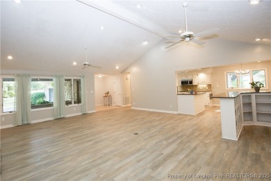 Welcome to this stunning 3-bedroom, 3-bath all-brick home on Woodlake Country Club in North Carolina - for sale on GolfHomes.com, golf home, golf lot