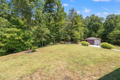 Welcome to this cozy Kentucky home neighboring the golf course! on Hickory Hills Country Club in Kentucky - for sale on GolfHomes.com, golf home, golf lot