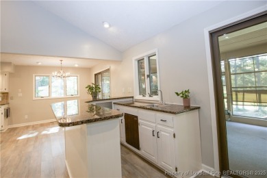 Welcome to this stunning 3-bedroom, 3-bath all-brick home on Woodlake Country Club in North Carolina - for sale on GolfHomes.com, golf home, golf lot