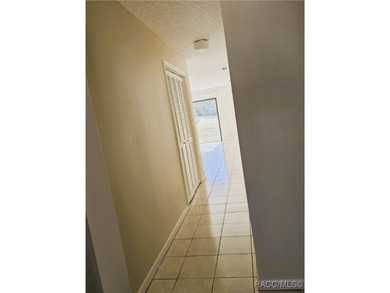 55 Chinaberry Circle is a charming single-family home located on on Sugarmill Woods Golf and Country Club in Florida - for sale on GolfHomes.com, golf home, golf lot