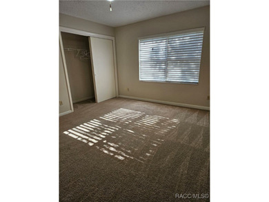 55 Chinaberry Circle is a charming single-family home located on on Sugarmill Woods Golf and Country Club in Florida - for sale on GolfHomes.com, golf home, golf lot