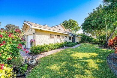 Enjoy comfortable South Florida living in this spacious 3-bed, 2 on Fountains Golf and Country Club in Florida - for sale on GolfHomes.com, golf home, golf lot