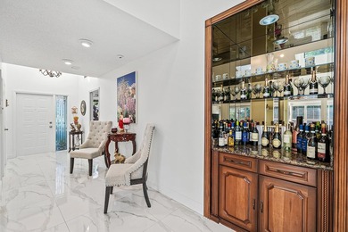 Enjoy comfortable South Florida living in this spacious 3-bed, 2 on Fountains Golf and Country Club in Florida - for sale on GolfHomes.com, golf home, golf lot