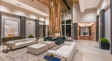 This stunning home overlooking a peaceful lake is located in one on Esplanade Golf and  Country Club in Florida - for sale on GolfHomes.com, golf home, golf lot