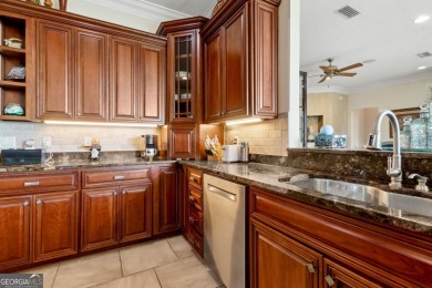 Enjoy serene views of the marsh and the golf course in this on The Club At Osprey Cove in Georgia - for sale on GolfHomes.com, golf home, golf lot