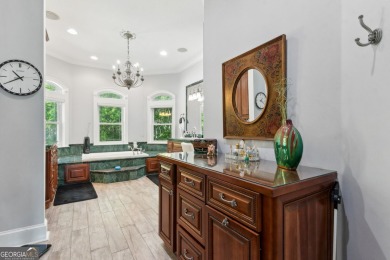 Enjoy serene views of the marsh and the golf course in this on The Club At Osprey Cove in Georgia - for sale on GolfHomes.com, golf home, golf lot
