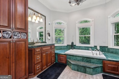 Enjoy serene views of the marsh and the golf course in this on The Club At Osprey Cove in Georgia - for sale on GolfHomes.com, golf home, golf lot