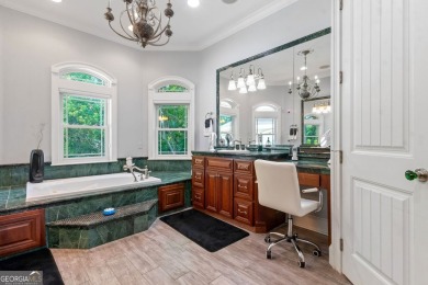 Enjoy serene views of the marsh and the golf course in this on The Club At Osprey Cove in Georgia - for sale on GolfHomes.com, golf home, golf lot