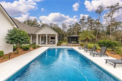 This home is located in the Hampton Point Subdivision. This on The King and Prince Golf Course, Home of the Hampton Club in Georgia - for sale on GolfHomes.com, golf home, golf lot